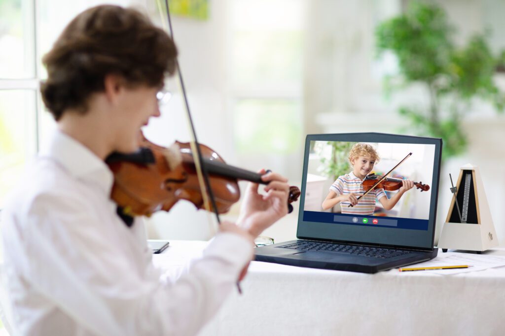 Violin,Lesson,Online.,Teacher,And,Child,Play,Violin,Via,Computer. one on one music lessons at a great price -