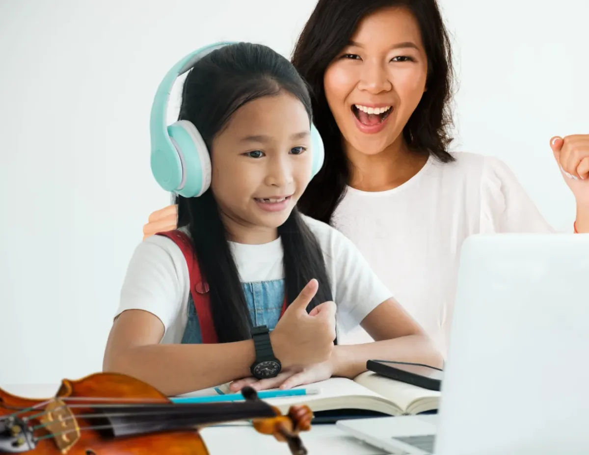 A parent and child learning together at home